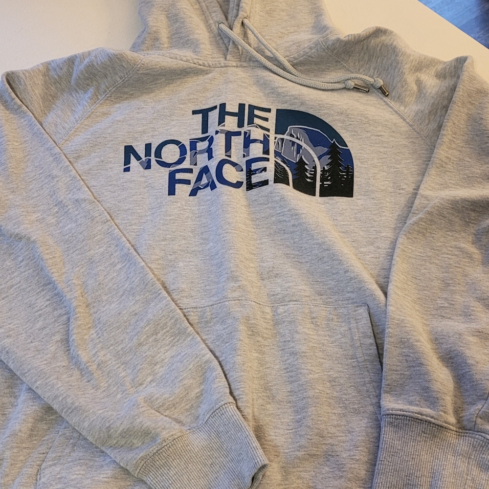 The North Face Light Gray Hoodie with Blue Logo